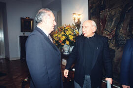 Recibe al Padre Renato Poblete y a Mario Kreutzberger